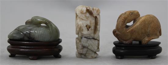 Two Chinese jade figures and a soapstone figure of a recumbent ram,